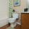 a bathroom with a toilet and sink